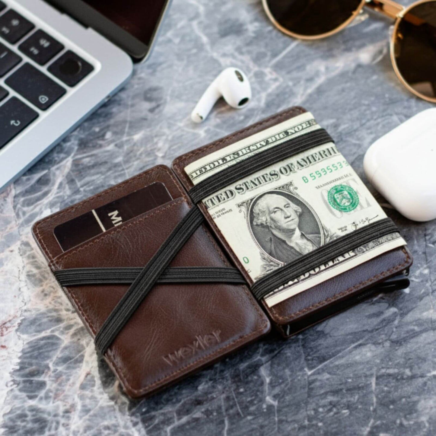 Close-up of Wex Magic Wallet holding cash and cards